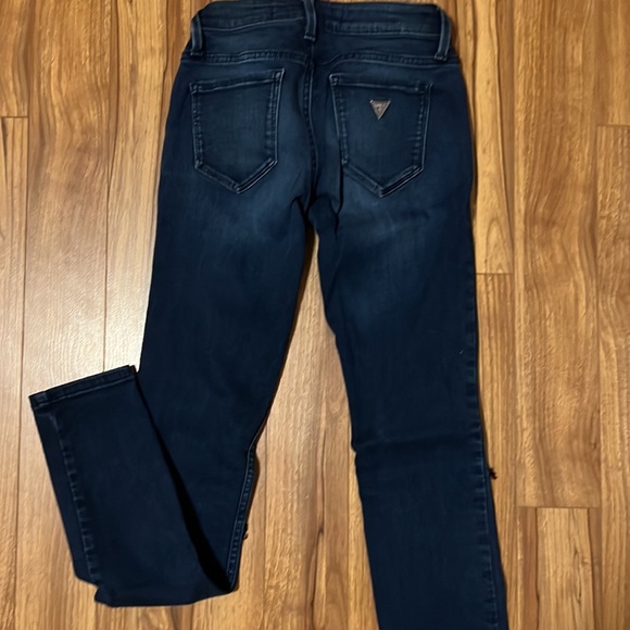 Dark denim with ripped front design soft and stretchy. Low rise - Picture 3 of 3